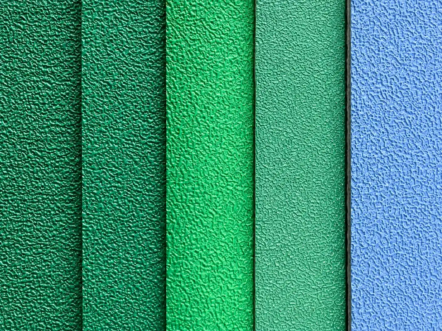 Green and blue badminton court surface textures